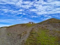 Ancient stone arch on top of empty hill in Wales Royalty Free Stock Photo