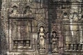 Ancient stone bas-relief in Angkor Wat, Cambodia. Ancient temple stone carving. Angkor Wat bas-relief Royalty Free Stock Photo