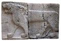 Ancient stone bas-relief with lion