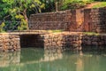 Ancient stone bridge across a canal on the road to the fortress of Sigiriya Lion Rock Royalty Free Stock Photo