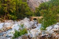 Ancient stone bridge across mountain river in Kesme Bogaz canyon, Antalya province in Turkey