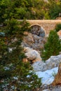 Ancient stone bridge across mountain river in Kesme Bogaz canyon, Antalya province in Turkey