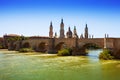 Ancient stone bridge over Ebro river in Zaragoza Royalty Free Stock Photo