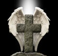 Ancient Stone Cross and Guardian Angel Wings Royalty Free Stock Photo