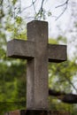 Ancient stone cross on old gravestone Royalty Free Stock Photo