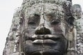 Ancient stone face in Bayon Temple Royalty Free Stock Photo