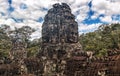 Ancient stone faces of Bayon temple, Angkor, Cambodia Royalty Free Stock Photo