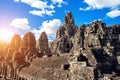 Ancient stone faces of Bayon temple, Angkor Wat, Siam Reap. Royalty Free Stock Photo