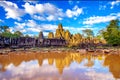 Ancient stone faces of Bayon temple, Angkor Wat, Siam Reap. Royalty Free Stock Photo