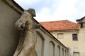 Ancient Stone Friar Statue In Church Yard