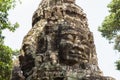 Ancient stone monument of Banteay Kdei temple, Angkor Wat, Cambodia. Ancient temple tower with face.