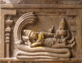 Ancient stone mural of Vishnu.