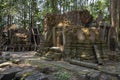 Ancient stone ruin of Preah Monti temple, Roluos, Cambodia. Stone carved decor on hindu temple. Cambodian landscape