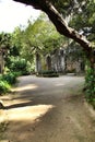 Ancient stone ruins in a leafy garden of Sintra Royalty Free Stock Photo