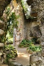 Ancient stone ruins in a leafy garden of Sintra Royalty Free Stock Photo