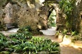 Ancient stone ruins in a leafy garden of Sintra Royalty Free Stock Photo