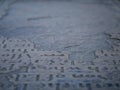 Ancient stone slab with carved lettering