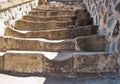 Ancient stone staircase going up, old building.