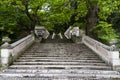 Ancient stone stairs in forest garden park Royalty Free Stock Photo