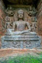 Ancient Stone Statue of Dhyani Buddha.in Monastery Udayagiri Royalty Free Stock Photo