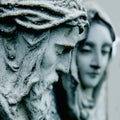 Ancient stone statue of Jesus Christ and Virgin Mary. Faith, religion, death, resurrection concept. Selective focus Royalty Free Stock Photo