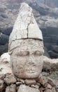 Ancient stone statue on the top of Nemrut mount, Turkey Royalty Free Stock Photo