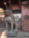 Ancient statue of Lion guards the entrance to the Palace at Durbar Square in Patan, Kathmandu Valley, Nepal Royalty Free Stock Photo