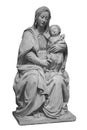 Ancient stone statue of the Virgin Mary with Jesus Christ isolated on white background. Sculpture with a Mother Mary and Royalty Free Stock Photo