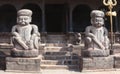 Ancient stone statue of warrior at Shiva temple on Durbar Square in Bhaktapur, Kathmandu, Nepal Royalty Free Stock Photo