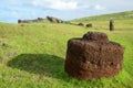 Ancient stone structures with pukao hat on Easter Island\'s landscape Royalty Free Stock Photo