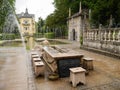 An ancient stone table with trick fountain at Hellbrunn palace