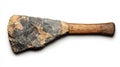 An ancient stone tool with a wooden handle, highlighting early human craftsmanship and survival techniques Royalty Free Stock Photo
