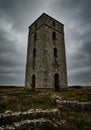 Ancient Stone Tower Under a Dramatic Sky Royalty Free Stock Photo