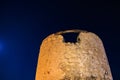 Ancient stone tower under starry night sky with rustic texture Royalty Free Stock Photo