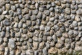 Ancient stone wall background image. Old English pebble dashed wall