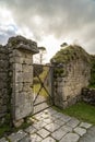Ancient Stone Wall with Blocked Gate Royalty Free Stock Photo