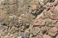 Ancient stone wall. Masonry of old dirty stones and bricks. Beautiful background. Royalty Free Stock Photo