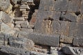 Ancient stone wall ruin on a sunny day. Old or vintage stonework architecture on a building with brown bricks. Antique