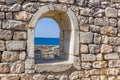 Ancient stone wall with a window Royalty Free Stock Photo