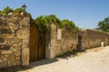 Ancient stone walls and narrow gravel streets in the historic village of Le Poet Laval in the Drome area of Provence. Royalty Free Stock Photo