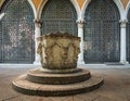 Ancient stone water well at Palazzo Franchetti in Venice, Italy. Popular tourist destination Royalty Free Stock Photo