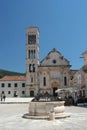 Ancient stone well and cathedral in Hvar, Croatia Royalty Free Stock Photo