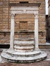 Ancient stone well in Pienza called Pozzo dei Cani Royalty Free Stock Photo