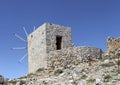 Ancient stone windmills Lassithi area, island Crete, Greece Royalty Free Stock Photo