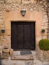 Ancient stone and wood door with lintel and Basque engraving