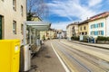 Ancient street with old houses and road.Traditional Swiss houses in the old town village.Tram way on street. Tram station. Royalty Free Stock Photo