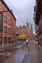 Ancient street of the 19th century from the red brick and medieval cathedral of Arhus. Denmark