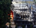 Thai Buddhist temple architectural detail. Golden Buddha statue Royalty Free Stock Photo