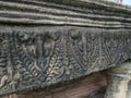 Ancient style pattern on sand stone carving at Phimai historical Royalty Free Stock Photo