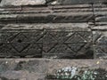 Ancient style pattern on sand stone carving at Phimai historical Royalty Free Stock Photo